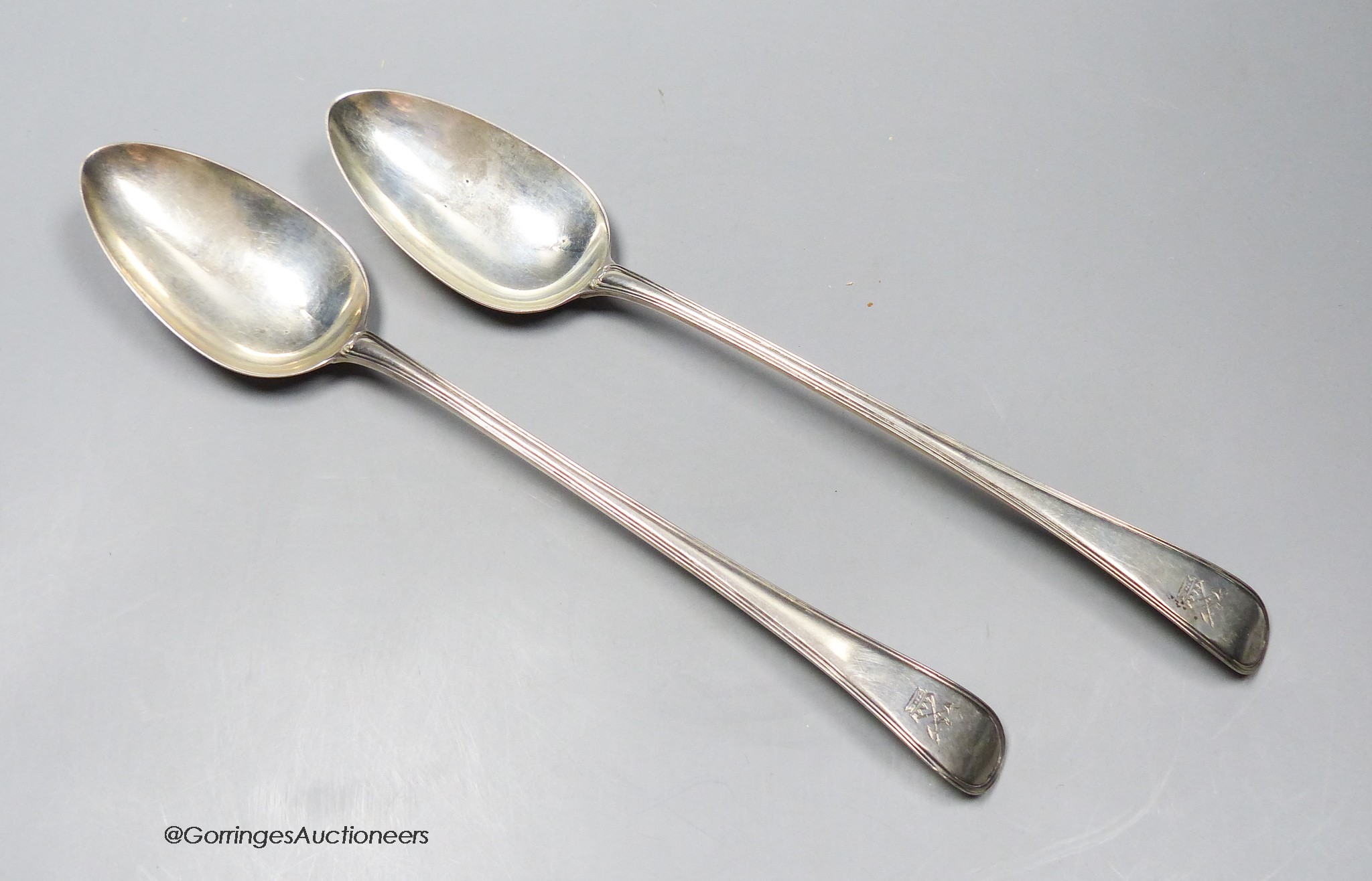 A pair of George III silver Old English thread pattern basting spoons, Smith & Fearn, London, 1793, 30cm, 6oz.